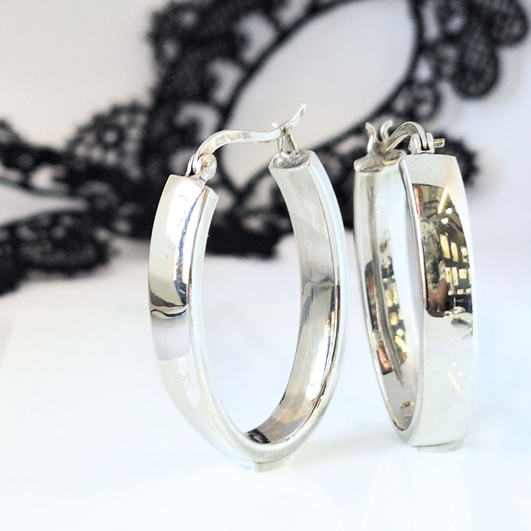 Hollow flat oval tube hinge hoops